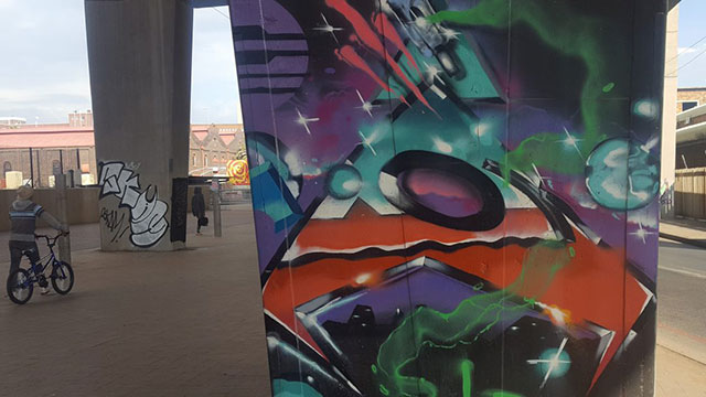 Graffiti on a concrete pillar in Johannesburg, South Africa. The city is considered the "graffiti capital" of Africa (courtesy Erik Ponder).