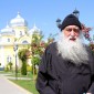 An Orthodox monk poses in front of the main church in Gagauzia