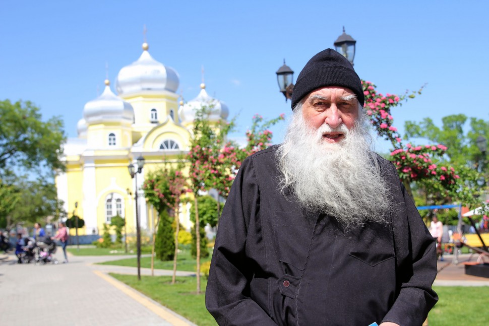 An Orthodox monk poses in front of the main church in Gagauzia