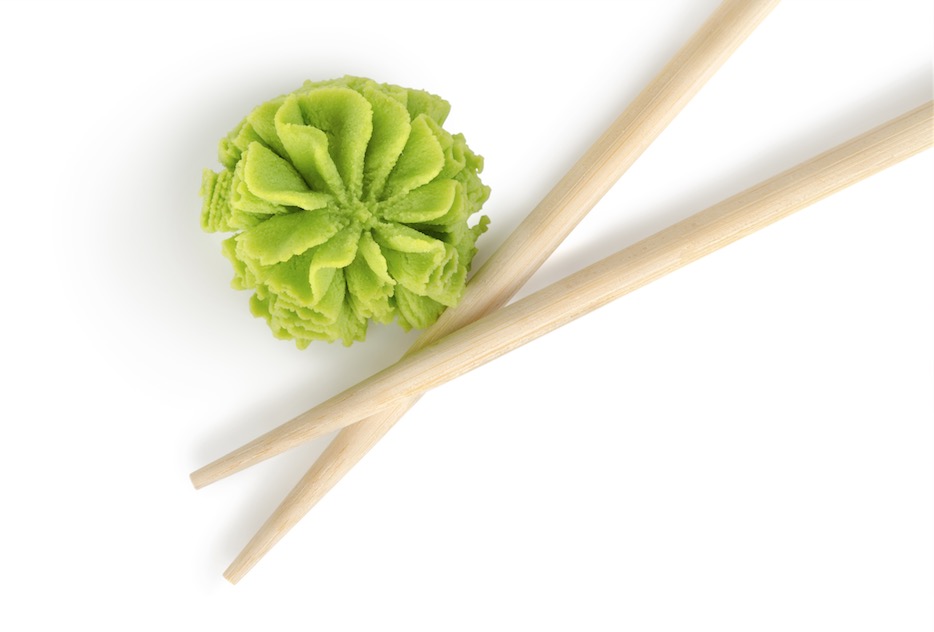 Green wasabi and a pair of chopsticks