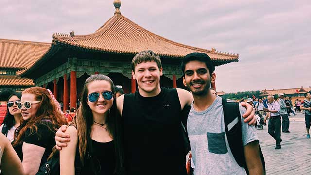 From the left, Cassie Helfer, Ross Kaufhold and Abhinav Talwar visit the Forbidden City as part of the 2017 Public Health in China program.