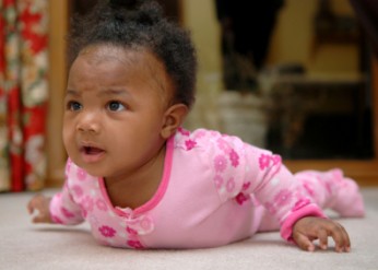 African American infant in pink
