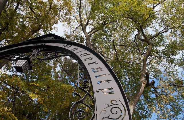The right side of Northwestern's Weber Arch with trees in the background