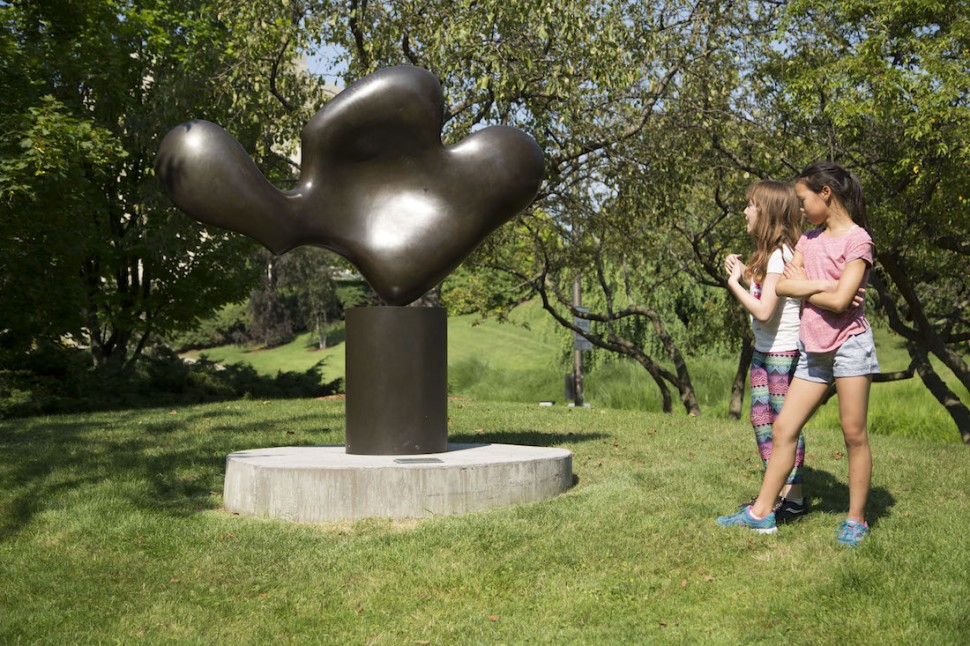 Children looking at statue