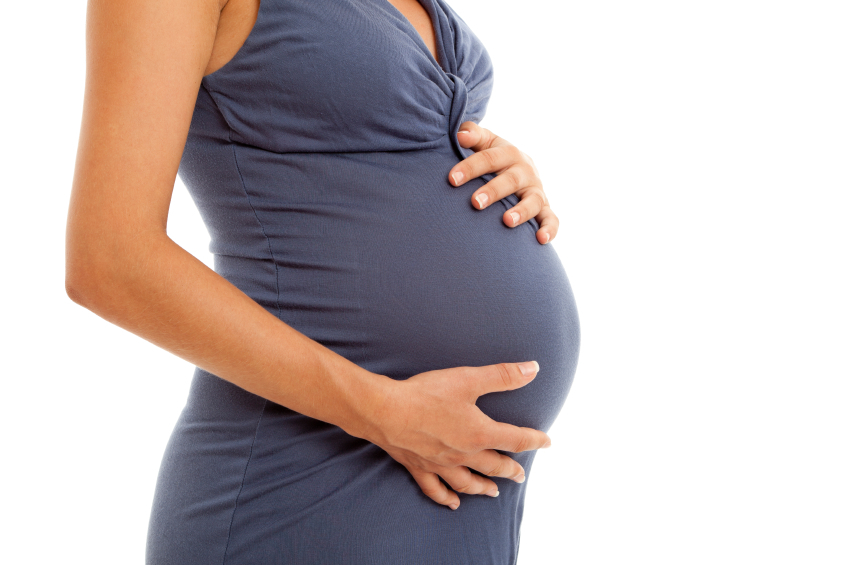 image of pregnant woman in blue dress