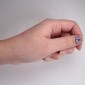 Small electronic on thumb nail 
