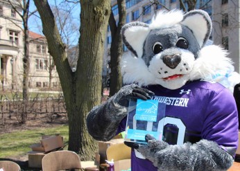 Northwestern mascot Willie holding ENERGY STAR award