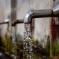 Water coming out of a faucet