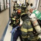 Image of firefighters conducting an emergency drill. 