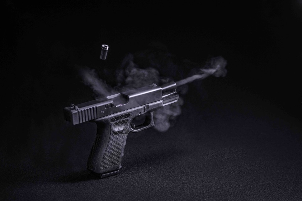 Image of a gun being shot