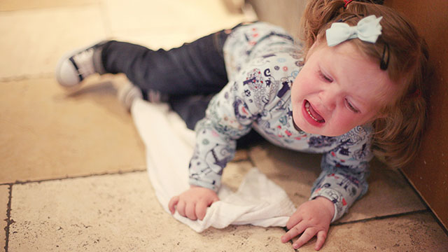 child throwing tantrum in school