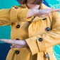 Photo of woman holding her hands in an equal sign symbol