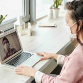 A doctor and COVID patient on a video call