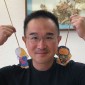 Alvin Chan presents the kamishibai 'Straw Hat Statues' for Imagine U Storytime