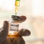a picture showing a covid vaccine vial