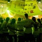 students arm in arm in the Dance Marathon tent