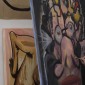 Student painting a canvas