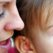 mother talking to baby