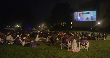 Movie audience outdoors at Norris