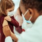 kid gets vaccine