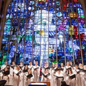 a choir sings in Alice Millar Chapel