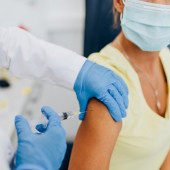 person getting a booster shot