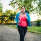 young woman jogs for good heart health