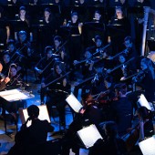 Donald Nally conducting orchestra and choirs