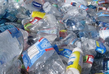 Method efficiently breaks down plastic bottles into component parts  