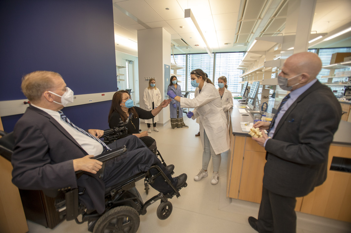 sen. tammy duckworth and rep. jim langevin with professor samuel stupp