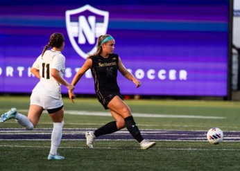 Two soccer players on the field