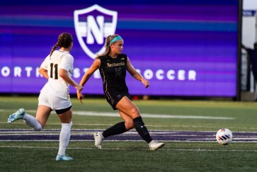 Two soccer players on the field