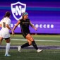 Two soccer players on the field