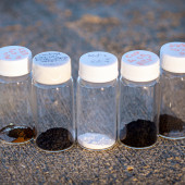 vials of materials on a concrete background