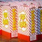 Popcorn boxes lined up on a table