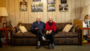 SuperAger Ralph Rehbock sits with his wife in his home. (Credit: Shane Collins, Northwestern University)