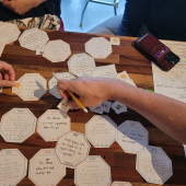 Testers playing Point Taken 