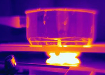 a thermal image of a pot on a lit stove