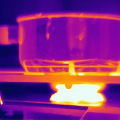 a thermal image of a pot on a lit stove