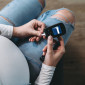 a pregnant person checks their glucose levels 