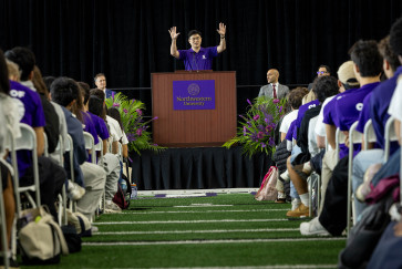 Mung Chiang addresses students from a podium during his first convocation address