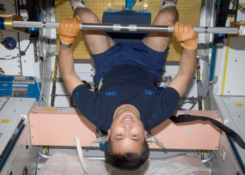 astronauts exercise in space