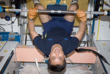 astronauts exercise in space