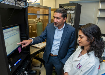 Study authors Drs. Sachin Patel (left) and Farhana Yasmin looking at brain recordings from central amygdala neurons
