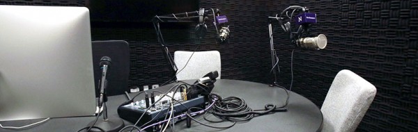 radio studio with microphones and sound dampening