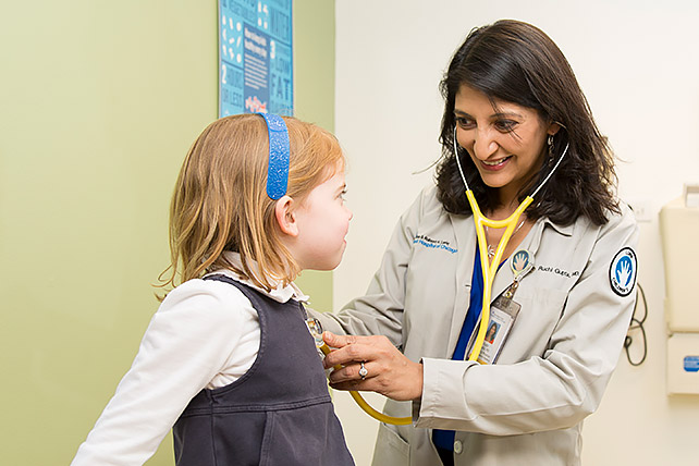 Dr. Ruchi Gupta treating child