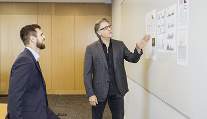Brian Uzzi and Adam Pah at board